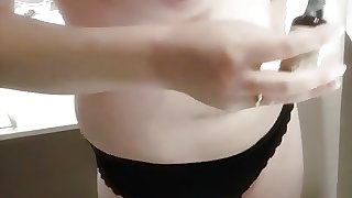 Wife oiling tits and belly