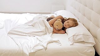 Sleepy babe dreams of sex with her big doll